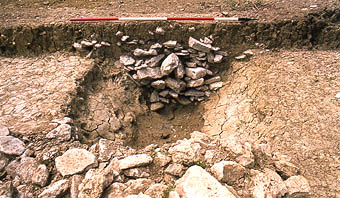 Inner ditch, area 1, with filling of stones.