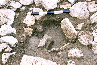 Post hole of probable corner turret.