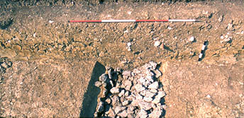 Inner ditch, area 3, with filling of stones.