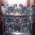 Carved wooden chair back