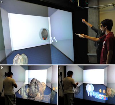  Powerwall condition. a) Changing light condition to explore objects. b) Manipulating objects (objects appear big on the screen due to off-axis parallax projection but the user perceives it as in real-life); c) Interacting with the objects without original colours (note the floating virtual menu in front of the user)