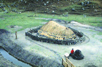 the reconstruction of a Pictish 'jelly-baby' house at Bostadh.