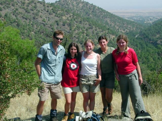 Figure 4: Team Central at Stavros (TP033) above the Asinou Valley, looking north, 5 August 2003: Colin Robins, Caroline Torres, Sarah Janes, Erin Gibson, Jackaline Robertson.