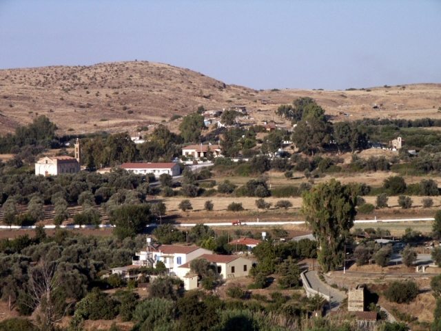 Figure 20: Part of Pano Phlasou, looking east, with Ayios Demetrianos (BU0080; left), the school, Ayios Yeoryios (BU0084; right); and Molos water mill (BU0076); bottom right). Photograph: Michael Given. 
