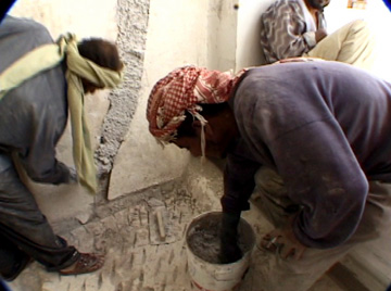 Image of repairing a wall crack.