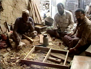 Image of some of the masons interviewed in the documentary, showing how moulds are constructed.