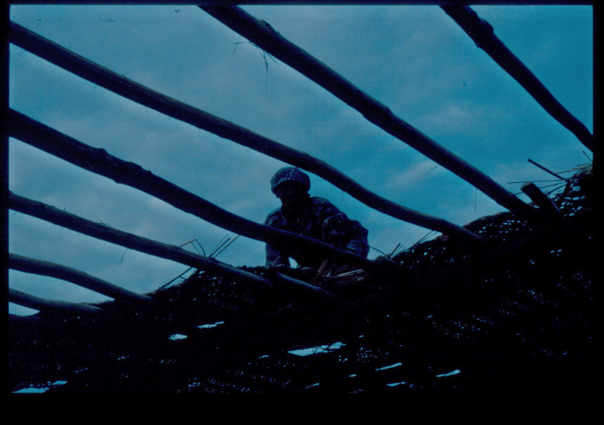 Man repairing roof