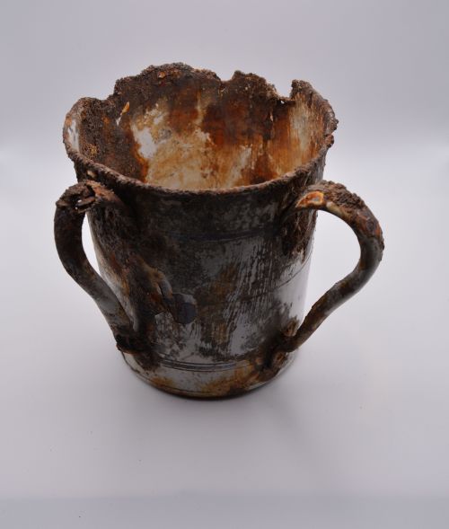 an old damaged cup
