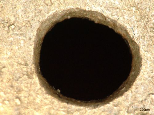 An even closer close up colour photograph of central hole