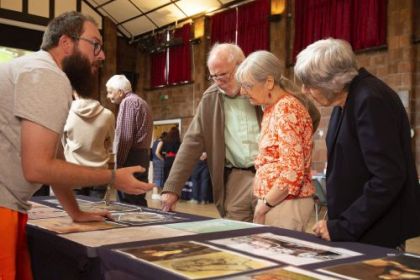 Photo of people talking at an open day