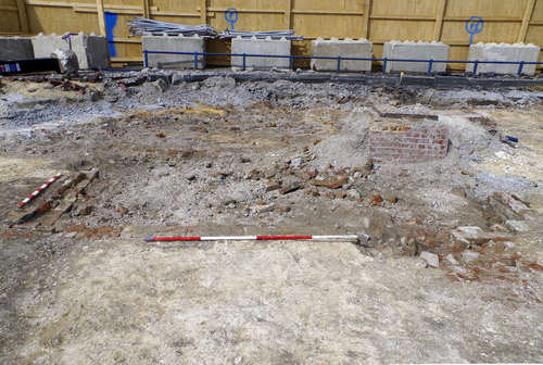 excavated trench showing exposed brickwork
